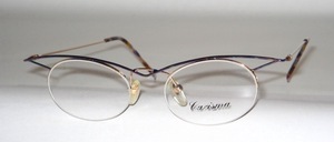 A feathery, semi-rimless, thin oval stainless steel Nylor frame
