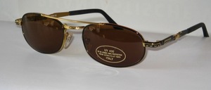 High quality, very nice unisex sunglasses, made in Italy in black - golden metal with brown CR 39 lenses with 100% UV protection
