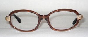 A beautiful, genuine '60s acetate frame with gold hatched metal hangers