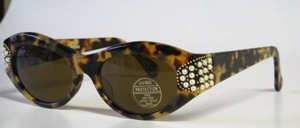 A high-quality, finely crafted acetate sunglasses with beautiful side beaded decor