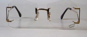 A great, rimless, real '80s sunglass, with extremely fashionable bottom hangers