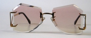 A great, rimless, real 80s facet sunglasses, with extremely stylish bottom hooks