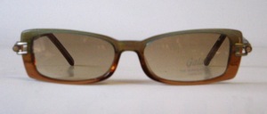 A very nice flat, cool GALA sunglasses with side strap rhinestone decor