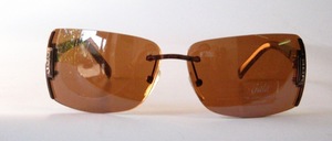 A very elegant rimless metal sunglasses from Gala with side street jewelry