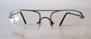 Semi-rimless 4-hole drill goggles in men's shape with clear deco glassed windows