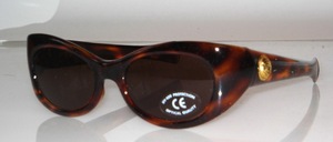 Italian, fashionable sunglasses with golden rose on the straps