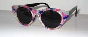 Modern, timeless pink-blue sunglasses with black inner frame and black temples