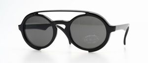 A funny double bridge sunglass with almost round discs