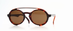 A funny double bridge sunglass with almost round discs