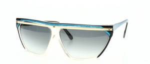 A fancy, hand-crafted acetate frame in a sleek design with a narrow top metal bar