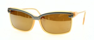 A handmade acetate frame with an upper aluminum bar