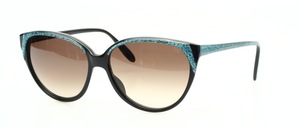A very nice and absolutely high <br />
most valuable, handcrafted ladies acetate sunglasses from PLAYGIRL from the 80s