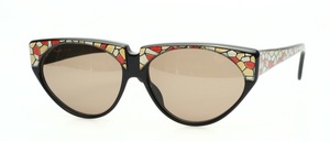 Solid vintage sunglasses with expressive tops