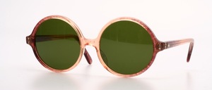 A high quality, round acetate frame with a small, discreet rhinestone decoration on the sides