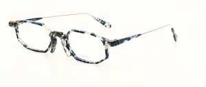 A fashionable, octagonal acetate eyeglass frame with fine metal temple tips