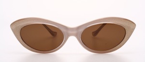 A beautiful, handcrafted acetate sunglasses in 1950s butterfly style in beige with gold, fine glitter