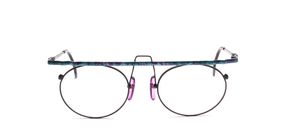 Funny metal frame in black with a green-purple patterned top bar and straps