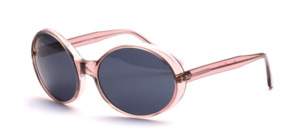 Large, oval vintage sunglasses made of acetate in transparent pink with gray mineral lenses