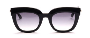 Extravagant ladies frame made of black acetate with golden metal hangers