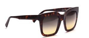 Oversize ladies glasses in dark schilpatt optics with Gau-Apricot glazing and temples on top