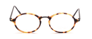 Oval eyeglasses in light brown spotted with black metal bridge and black temples by Valentino Toscani