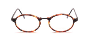 Oval acetate eyeglasses in brown patterned with black metal bridge and black temples by Valentino Toscani
