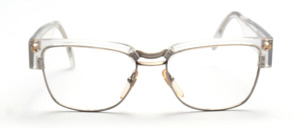 Magnificent glasses by Augusto Valentini from the 90s in silver metal with a transparent acetate frame at the top and wide acetate arms