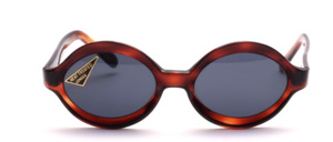 Slightly smaller oval 1970s acetate sunglasses with a wider glass frame