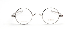 Round, antique-style metal frame by Braun Classics in silver with temple arms