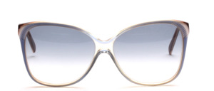 A high quality, slightly larger acetate sunglasses in <br />
slight butterfly shape
