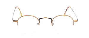 Half-rim goggles in antique gold with fine chisels on the front and on the temples
