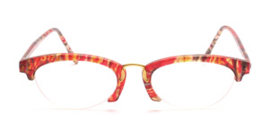 Semi-rimless, oval ladies acetate eyeglass frame with a beautifully curved metal nose bridge