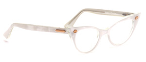 1950s vintage cat eye frame in transparent, pearl white on the outside and with gold decorative rivets on the front and on the temples