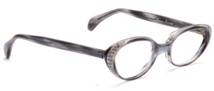 Beautifully curved vintage women's frame from the 60s in shimmering gray with lush rhinestone decor on the side