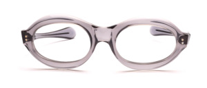 Strong oval women's frame made of thick acetate in transparent gray with decorative rivets on the sides