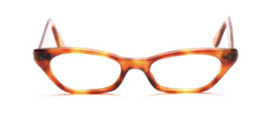Sixties sunglasses in light brown cat eye shape with decorative rivets on the middle part