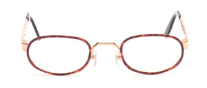 Golden metal frame with a dark brown glass rim and wide perforated straps