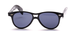 Classic, chic vintage 80s sunglasses with wide temple tips and decorative studs on the sides