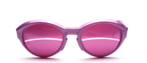 Cool sunglasses from the 1980s with a slot made of purple plastic in the style of Courreges
