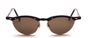 Semi-rimless ladies sunglasses in aluminum with gold screws and decorative rivets