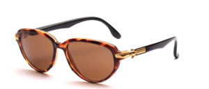 An absolutely fashionably designed sunglasses with golden metal side panels