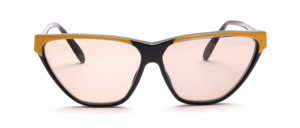 Big vintage cat eye glasses from the 80s in black with yellow at the top edge of the frame and placed on the temples