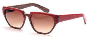 Ladies frame from the 80s with wood grain and a raspberry red surface in front and on the temples