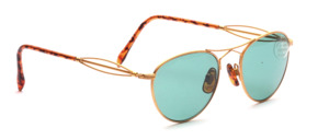 Metal sunglasses in decorative design in matt gold with green discs