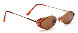 Small oval metal sunglasses in matt gold with narrow side protection made of brown patterned plastic