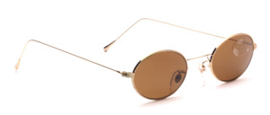 Oval stainless steel sunglasses in gold with brown lenses