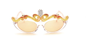 Imaginative sunglasses, handmade, with a lavishly decorated middle section and green rhinestone decor