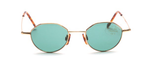 Small golden metal glasses with green slices