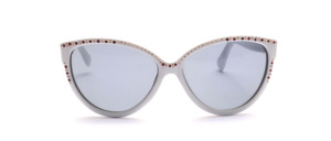 White cat eye sunglasses from the 80s with pink rhinestones