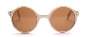 Round vintage sunglasses from the 70s in white with brown lenses